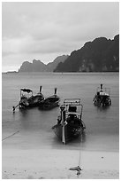 Beach and longtail boats in rainy weather, Ao Ton Sai, Ko Phi Phi. Krabi Province, Thailand (black and white)