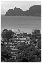 Village, bay and cliffs, Ko Phi-Phi island. Krabi Province, Thailand ( black and white)