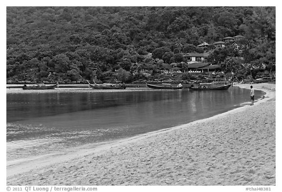 Man standing alone on beach, Ao Lo Dalam, Phi-Phi island. Krabi Province, Thailand (black and white)