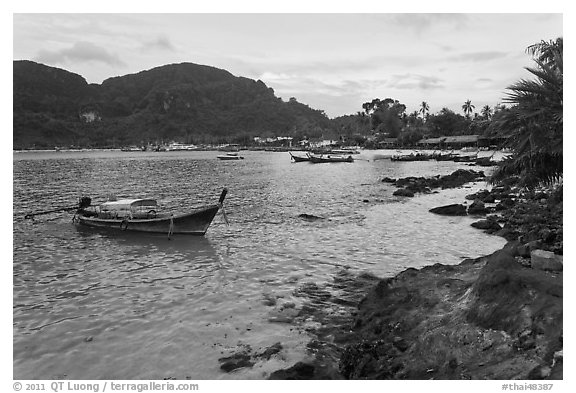 Long tail boat, and Tonsai village, Ko Phi-Phi Don. Krabi Province, Thailand (black and white)