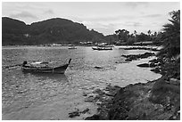 Long tail boat, and Tonsai village, Ko Phi-Phi Don. Krabi Province, Thailand ( black and white)