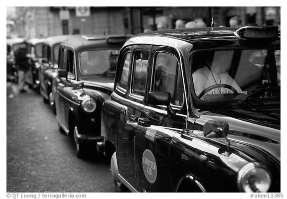 Black London cabs. London, England, United Kingdom (black and white)