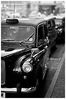 Black London taxis. London, England, United Kingdom ( black and white)