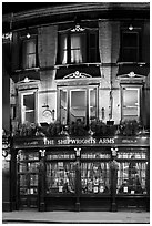 Building housing the pub Shipwrights Arms at night. London, England, United Kingdom ( black and white)