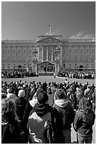 Tourists waiting for the changing of the guard in front of Buckingham Palace. London, England, United Kingdom (black and white)