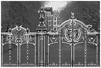 Gilded grids and park near Buckingham Palace. London, England, United Kingdom ( black and white)