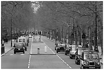 Black cabs and street near Saint James Park with. London, England, United Kingdom ( black and white)