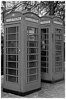 Two red phone boxes. London, England, United Kingdom (black and white)