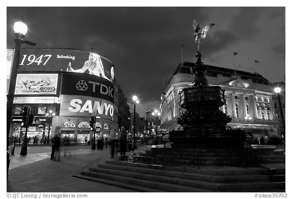 Neon advertising and Eros statue, Piccadilly Circus. London, England, United Kingdom (black and white)