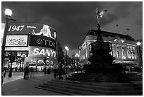Neon advertising and Eros statue, Piccadilly Circus. London, England, United Kingdom ( black and white)