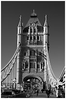 Commute hour on Tower Bridge, early morning. London, England, United Kingdom ( black and white)