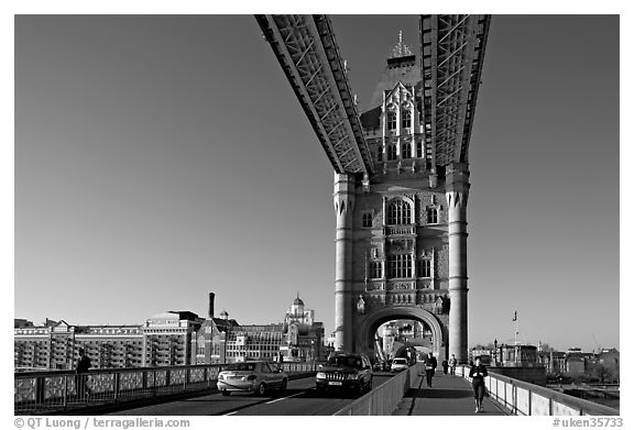 Jogger and South Tower of Tower Bridge,  early morning. London, England, United Kingdom