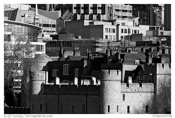 Tower of London and modern buildings. London, England, United Kingdom (black and white)