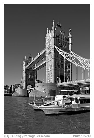 Catamaran below Tower Bridge. London, England, United Kingdom (black and white)