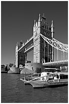 Catamaran below Tower Bridge. London, England, United Kingdom (black and white)