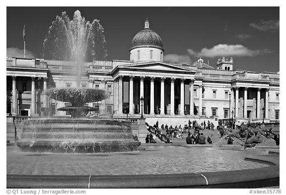 Fountain ( designed by Lutyens in 1939) and National Gallery, Trafalgar Square. London, England, United Kingdom (black and white)