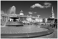 Fountain, National Gallery, and  St Martin's-in-the-Fields church, Trafalgar Square. London, England, United Kingdom (black and white)