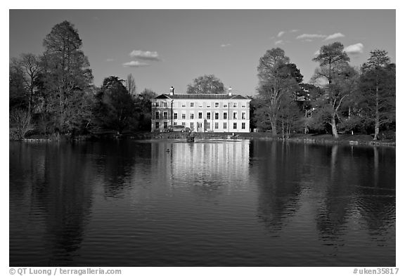 Museum No 1 reflected in lake, late afternoon. Kew Royal Botanical Gardens,  London, England, United Kingdom (black and white)