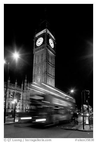 Big Ben and double decker bus in motion at nite. London, England, United Kingdom (black and white)