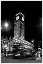 Big Ben and double decker bus in motion at nite. London, England, United Kingdom ( black and white)