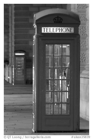 Red phone booth at night. London, England, United Kingdom