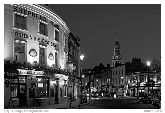 Tavern, street, and church at night. Greenwich, London, England, United Kingdom (black and white)
