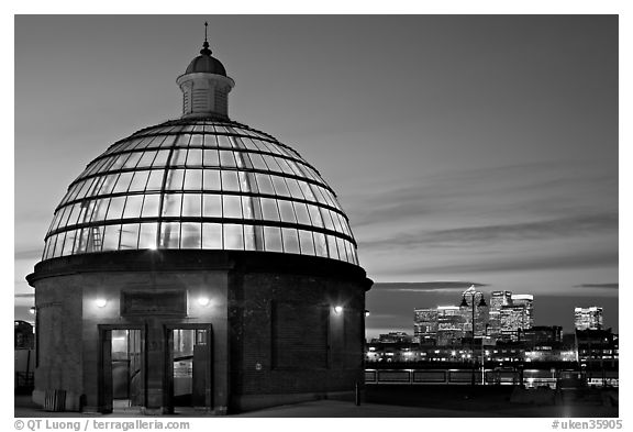 Entrance of foot tunnel under the Thames and Docklands buildings at dusk. Greenwich, London, England, United Kingdom