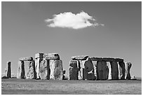 Stone circle and isolated cloud, Stonehenge, Salisbury. England, United Kingdom ( black and white)