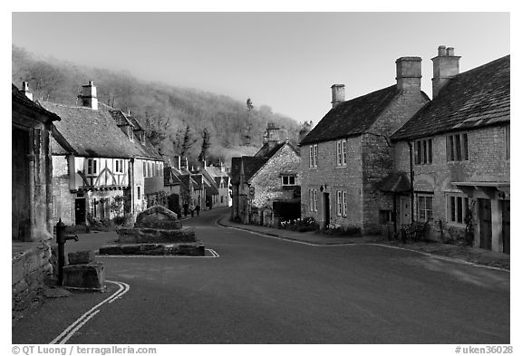 Main village street,  half timbered Court House, and Butter Cross, Castle Combe. Wiltshire, England, United Kingdom