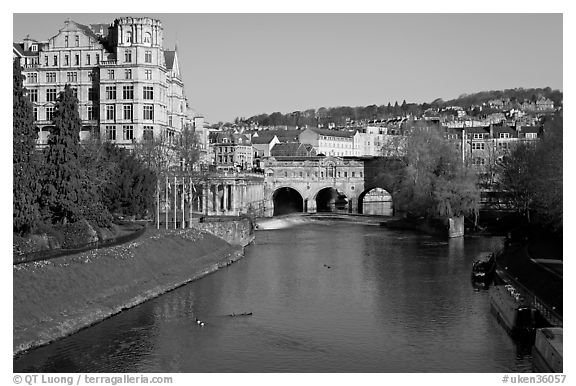 Avon River, Empire hotel, and Pulteney Bridge, morning. Bath, Somerset, England, United Kingdom (black and white)
