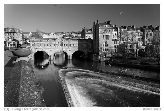 Weir on the Avon River and Pulteney Bridge. Bath, Somerset, England, United Kingdom (black and white)
