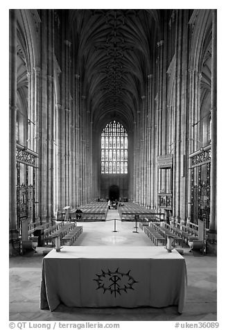 Altar, soaring arches of the Nave, and stained glass, Canterbury Cathedral. Canterbury,  Kent, England, United Kingdom