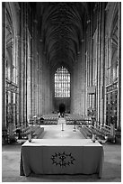 Altar, soaring arches of the Nave, and stained glass, Canterbury Cathedral. Canterbury,  Kent, England, United Kingdom ( black and white)