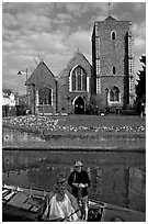 Rowboat, River Stour, Guildhall (former Holy Cross church). Canterbury,  Kent, England, United Kingdom (black and white)