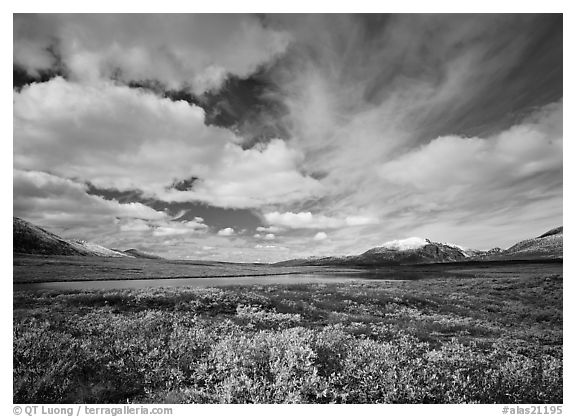 Clouds, tundra, and lake along Denali Highway in autumn. Alaska, USA (black and white)