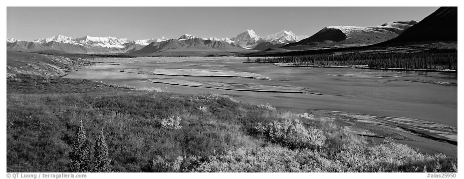 Tundra autumn scenery with wide river and mountains. Alaska, USA (black and white)