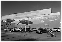 Parking lot with whale mural in background. Anchorage, Alaska, USA (black and white)
