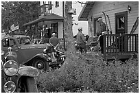 Vintage cars and houses on main street. McCarthy, Alaska, USA (black and white)