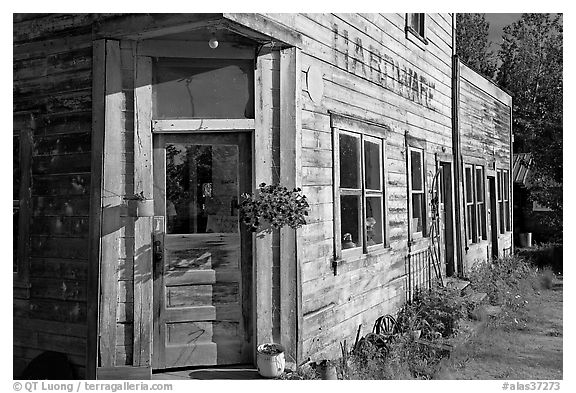 Weathered old hardware store. McCarthy, Alaska, USA (black and white)