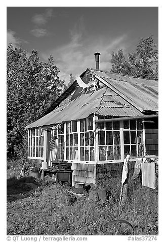 House with antlers and american flag. McCarthy, Alaska, USA