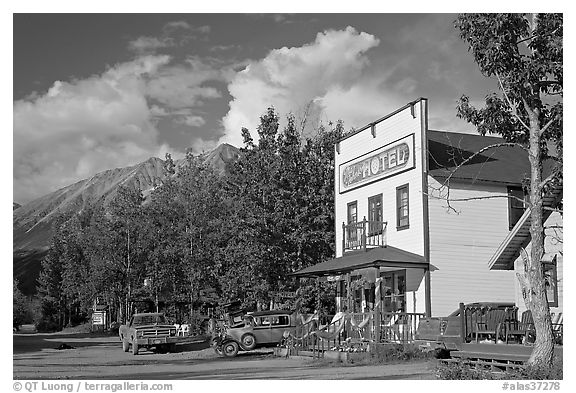 Hotel, main street, vintage car, and truck. McCarthy, Alaska, USA (black and white)