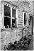 Windows and doors of old wooden building. McCarthy, Alaska, USA (black and white)