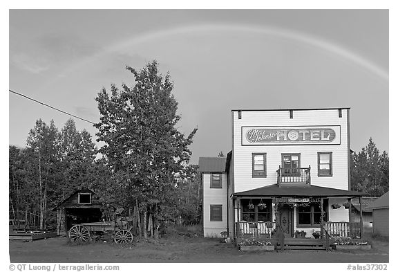 Rainbow over the historic Ma Johnson hotel building. McCarthy, Alaska, USA