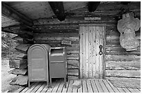 Mail boxes, log house post office, Slana. Alaska, USA ( black and white)