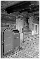 postal boxes, log house postal office, Slana. Alaska, USA (black and white)