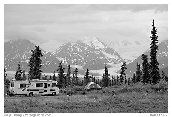 RV, tent, with glacier and mountains in background. Alaska, USA (black and white)