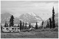 RV, tent, with glacier and mountains in background. Alaska, USA ( black and white)