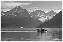 Fishing boat, mountains and glaciers. Seward, Alaska, USA (black and white)