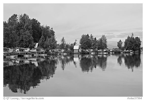 Sea planes and reflections. Anchorage, Alaska, USA (black and white)