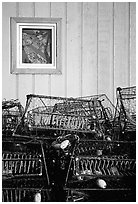 Fishing baskets and wall. Kotzebue, North Western Alaska, USA ( black and white)
